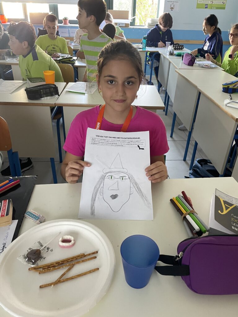 Picture of student with drawing