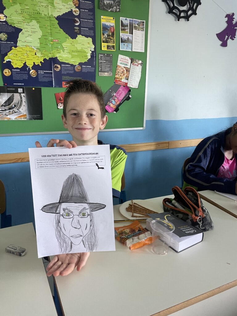 Picture of student with drawing