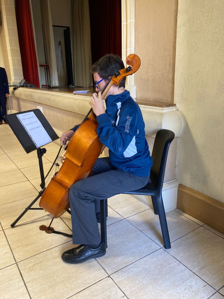 Picture of student playing instrument
