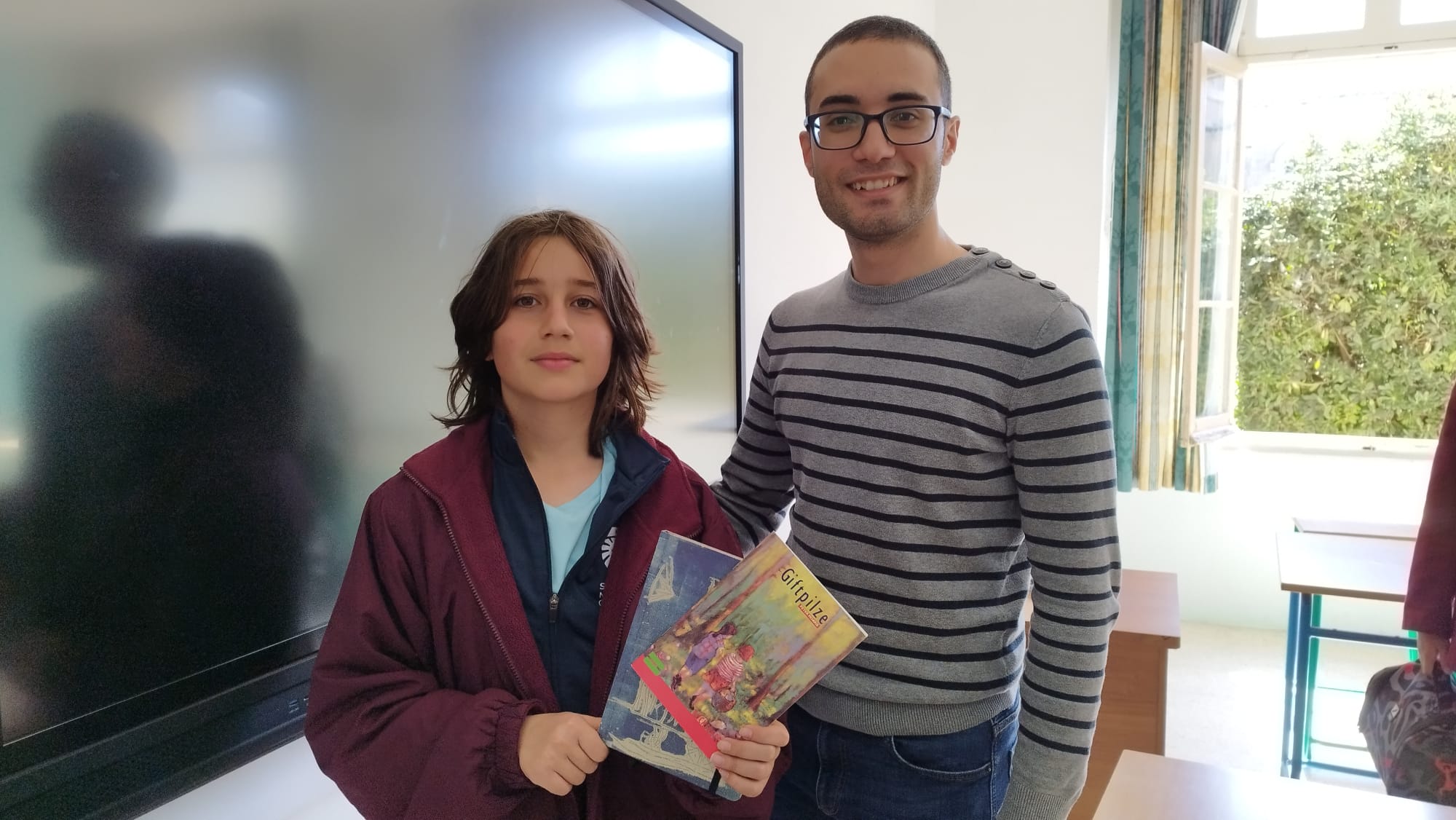 Picture of student and teacher